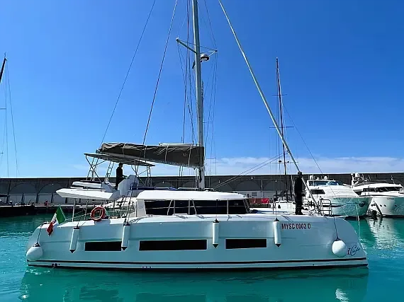 Dufour Catamaran 48 in Sardinia / Olbia / Marina Golfo Cugnana - image 1